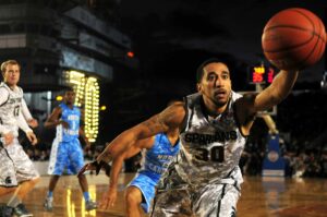 Men playing basketball